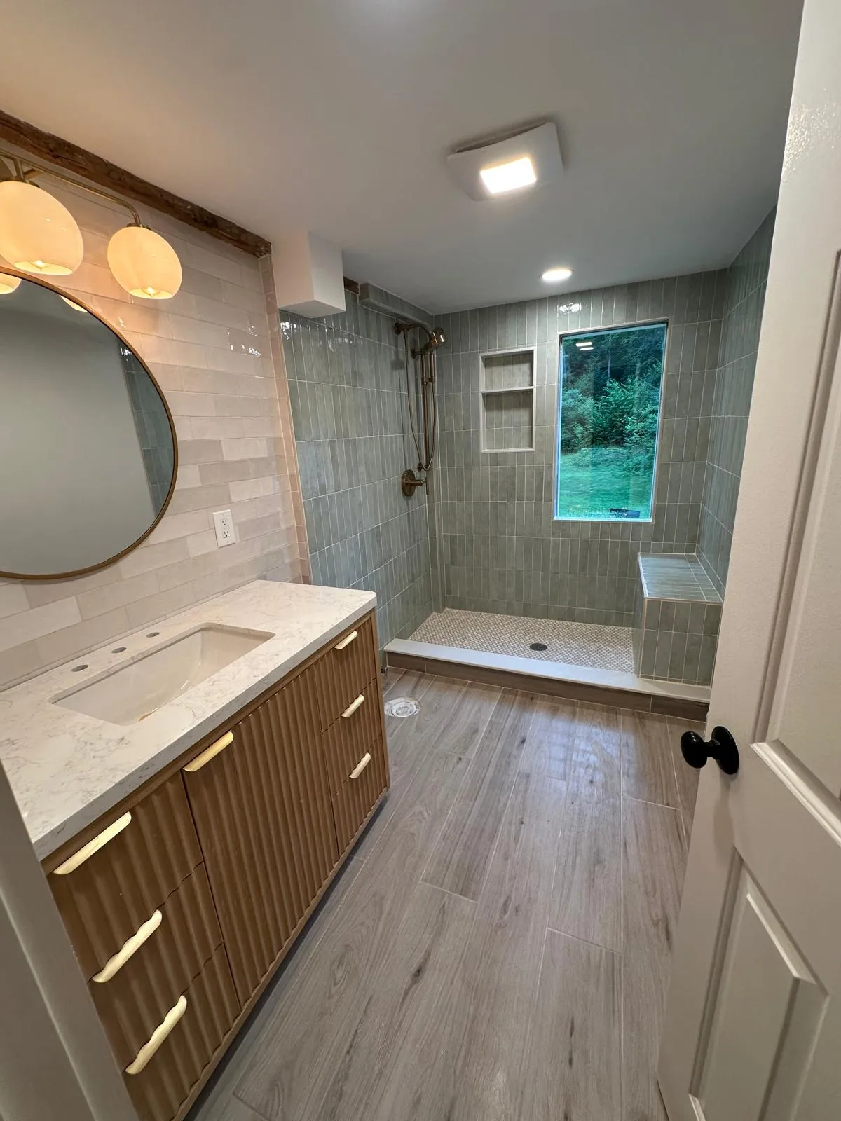 Bathroom remodeling in New Hampshire with tiled walk in shower
