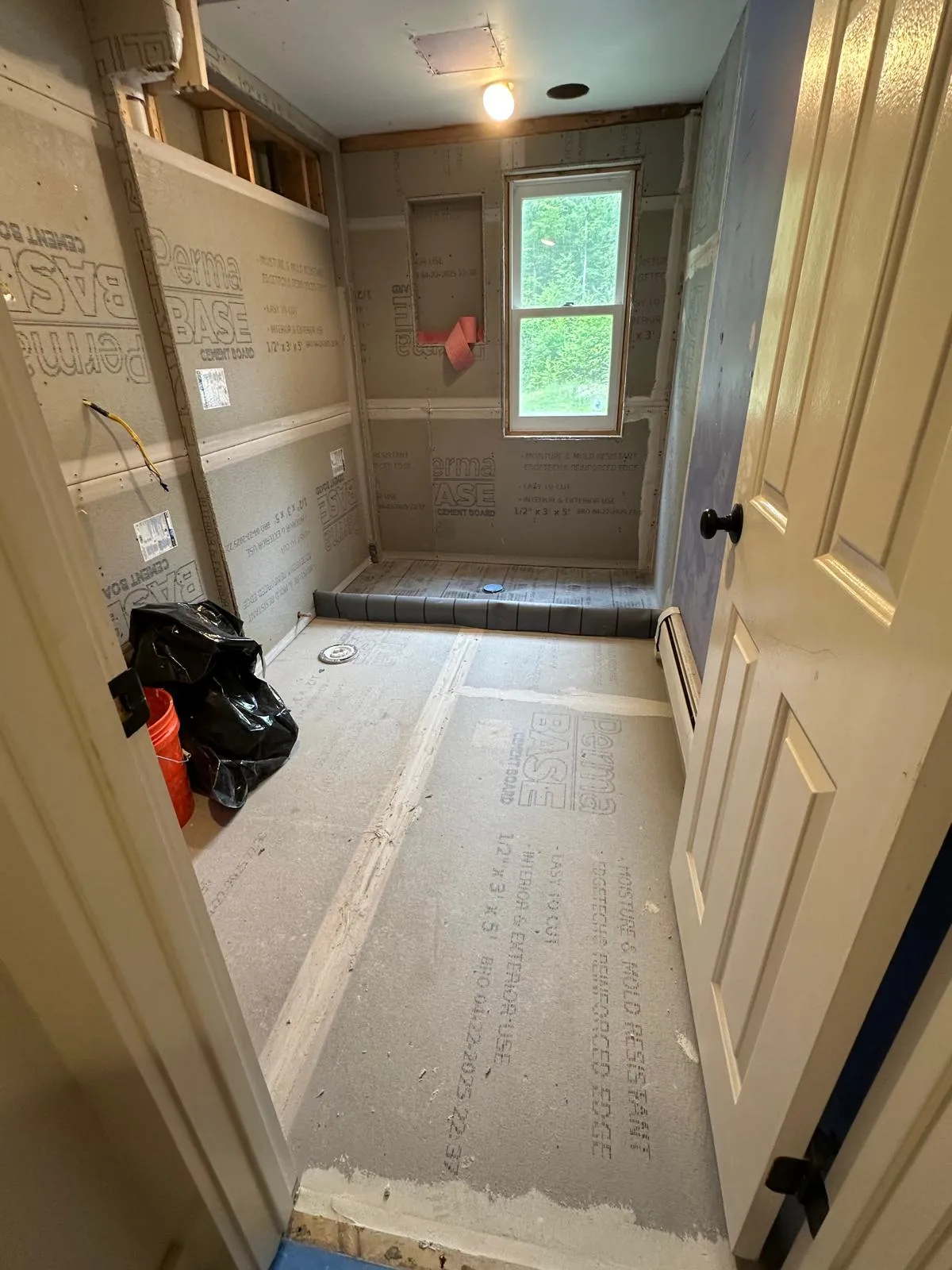 Completed bathroom remodel with modern fixtures in New Hampshire, New Generation General Construction
