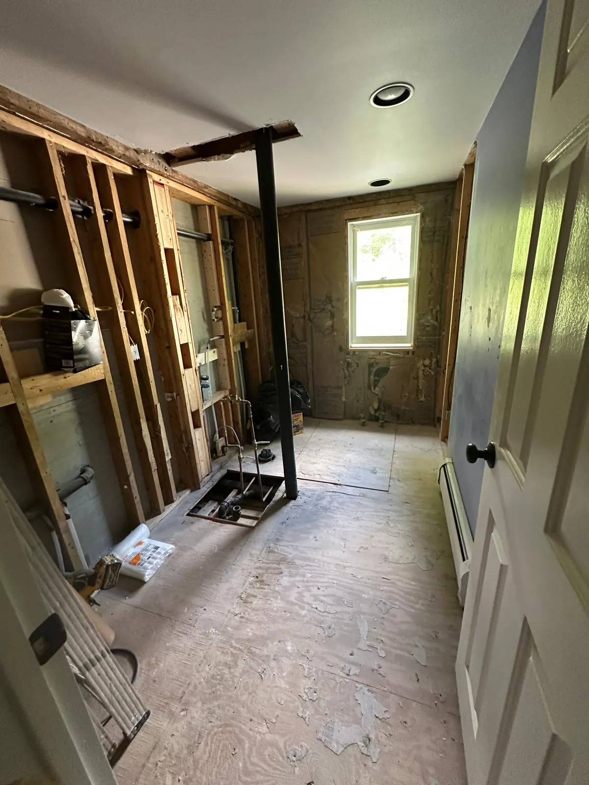 Bathroom vanity and tile floor installation in New Hampshire, New Generation General Construction